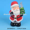 Handmade christmas lamp with ceramic santa claus figurine for hanging